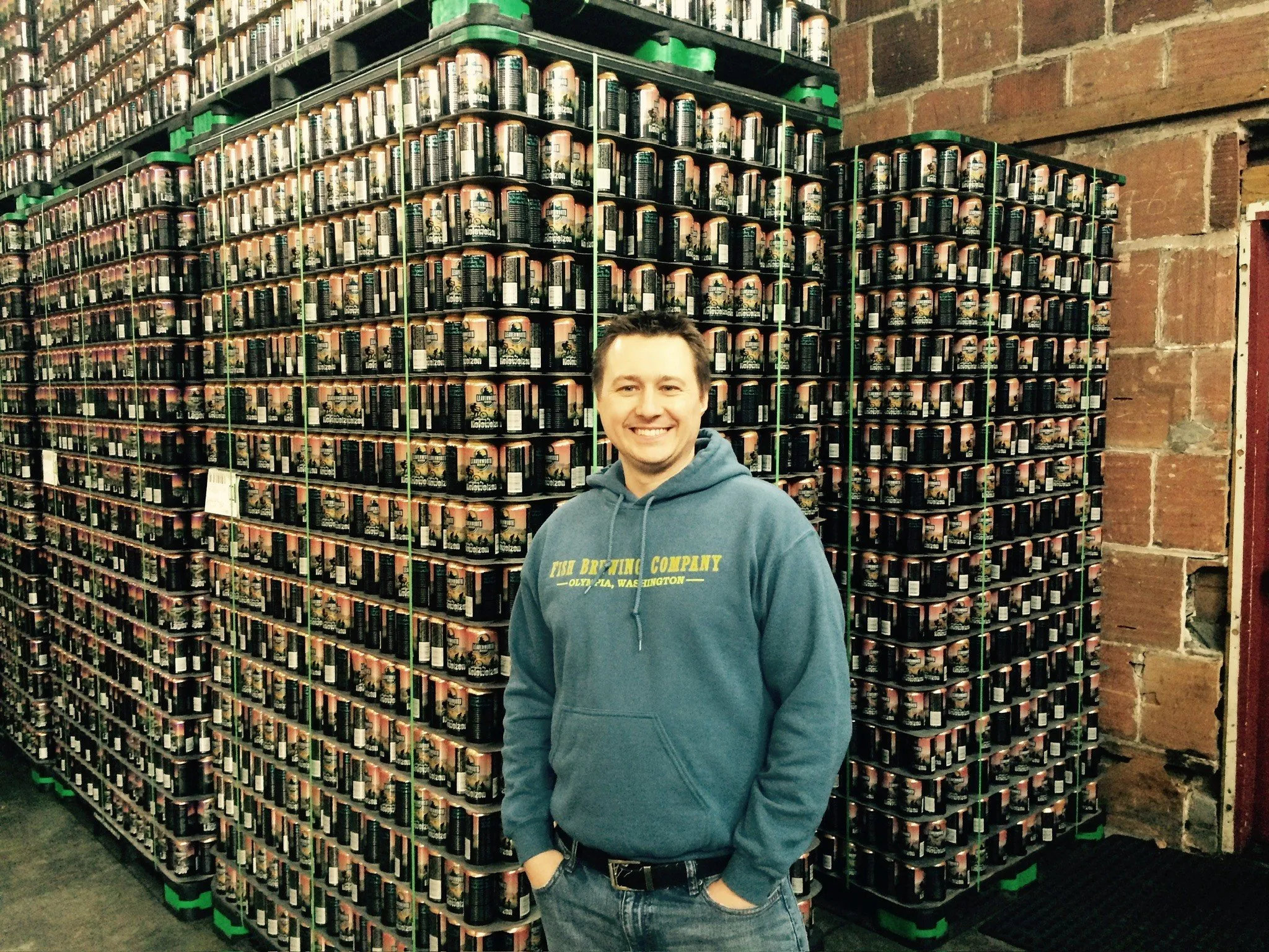 Matthew with pallets of finished product