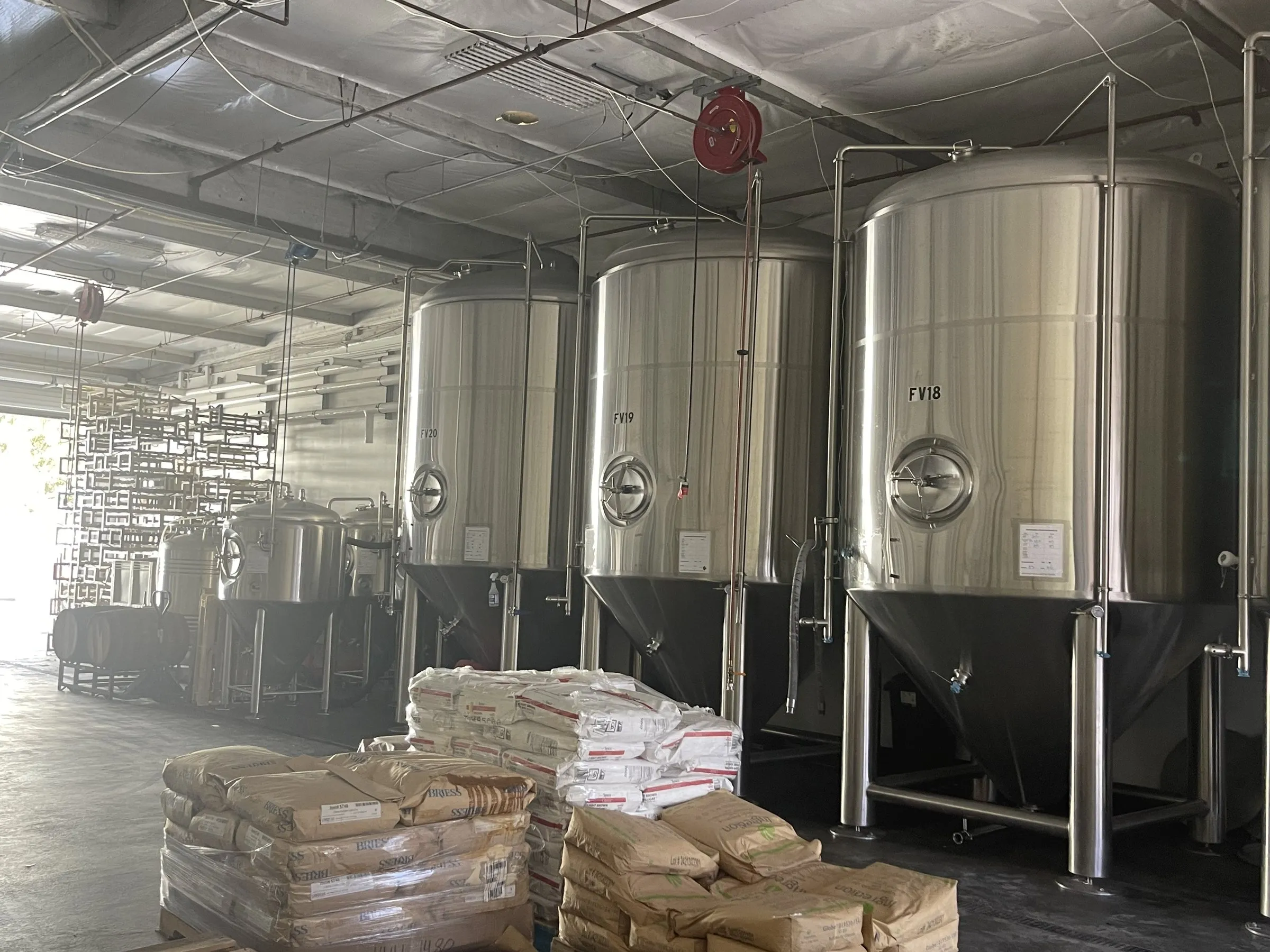 Fermenters and malt staged for production